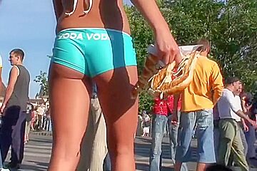 Street candid teen in turquoise short...