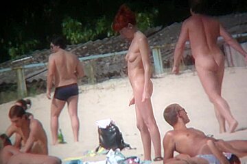 Nudist beach voyeur shoots naked babes...