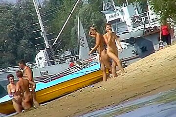 Women Filmed By A Voyeur On The Nudist Beach...