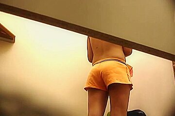 Sexy dressing room spy cam shots with amateur in shorts