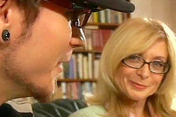 Nina Hartley With Younger Mate...
