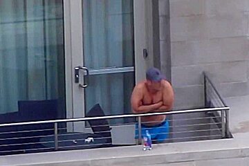 Sexy guy at balcony...