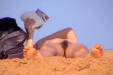 Mature Woman Lying Naked On The Beach Got Voyeured...