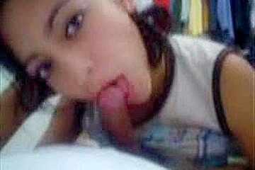 Mexican college girl giving sexy oral...