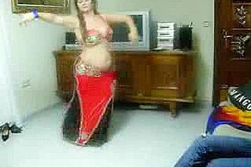 Mature curvy woman belly-dancing in this sensual show porn