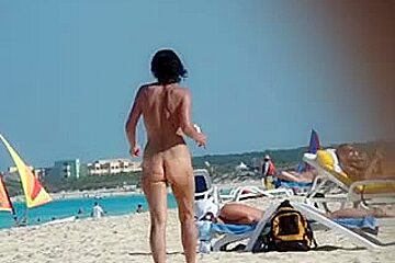 Voyuers video featuring sunbathing beach...
