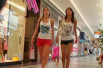 Four extremely hot sexy legs in this street candid video