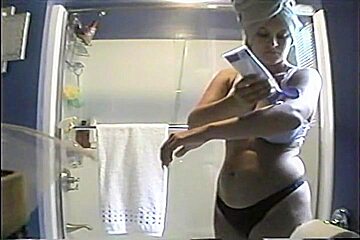 Hidden cam in the bathroom catches a beautiful girl