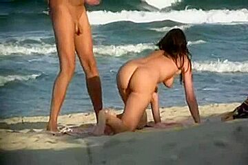 Adult couple takes rest without hesitate on the nude beach