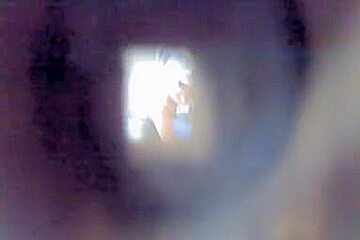 Hole in changing room wall lets me voyeur amateur fem