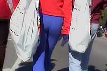 Tight blue pants wrapping the candid...