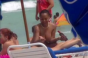 Plump breasted girl caught voyeur beach...