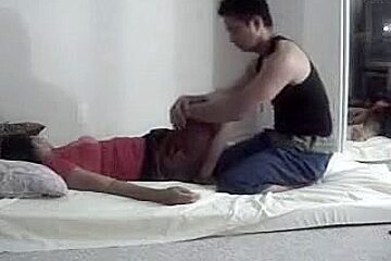 Asian Woman Receives A Foot Massage...