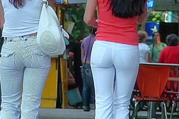 Two Ladies With Sexy Asses Walking Down...