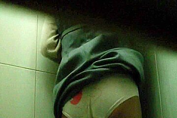 Black-haired chicks caught on hidden camera while they were peeing