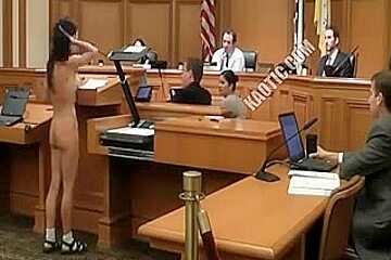 Hippy nudist undresses off during court...