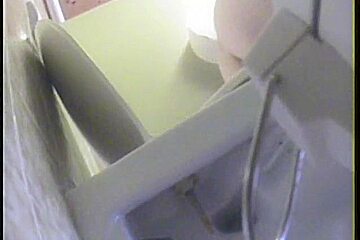 Naked girl caught on cam in toilet taking a piss