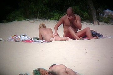 Nudist beach is full of voyeurs...