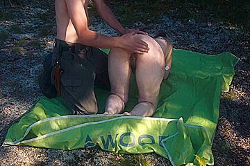 Outdoor camping with vibrator tied to...