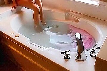 Adorable legal age teenager gal Eufrat gratifying herself in the bathtub