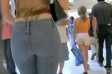Wench with a perfect ass walks around the mall