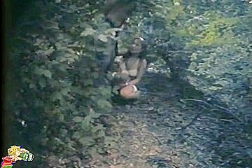 Couple hiding in the woods to take a piss on spy cam