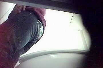 On this spy cam you can see babes pissing in toilet