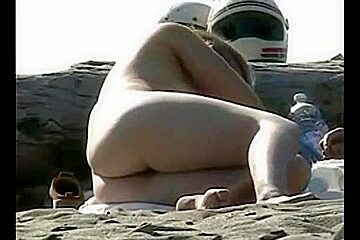 Nude sunbathing girls are shot with...