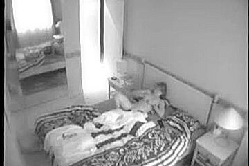 Hotel spy cam footage of woman...