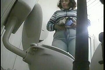 Chick got her butt recorded on a spying camera in a toilet
