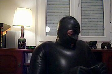 Hawt babe in mask and rubber acquires tortured