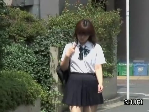Asian schoolgirl street sharked at the vending machine.